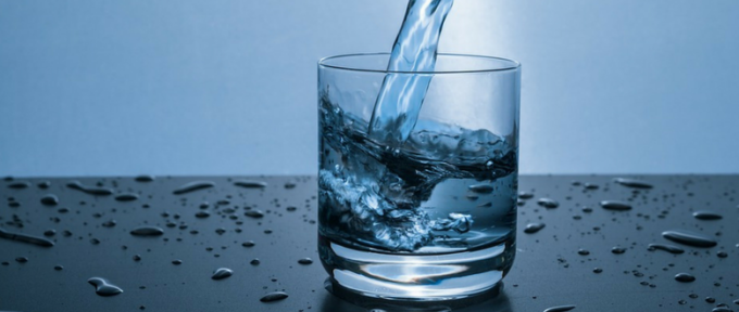 glass of water being poured