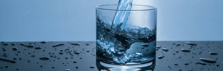 glass of water being poured