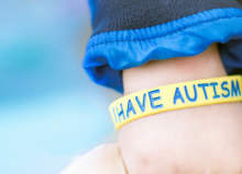 i have autism wristband on little boy