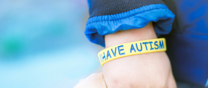 i have autism wristband on little boy