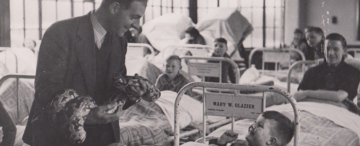 belle vue zookeeper visiting children in the hospital with a snake