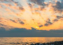 sunset clouds by the sea