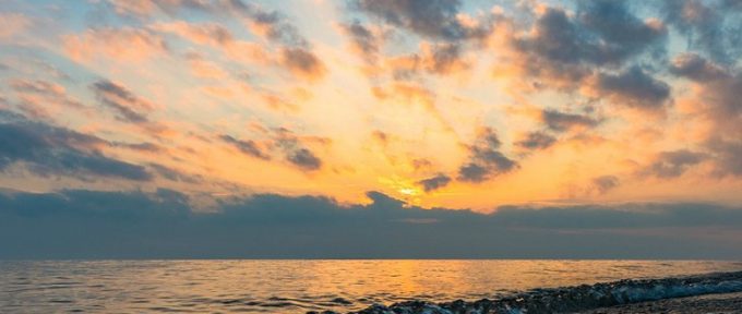 sunset clouds by the sea