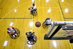 wheelchair users playing basketball