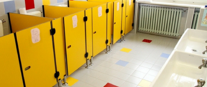 yellow toilet cubicles