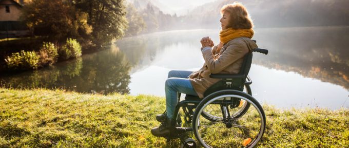 woman by the lake in the countryside