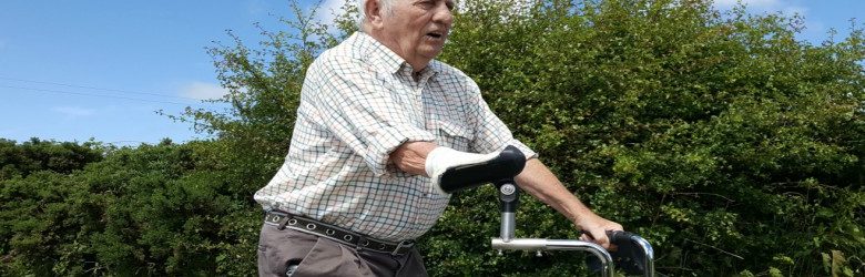 remap rollator being used by elderly man