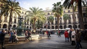 people walking through barcelona