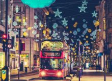 christmas outdoors in london with red bus approaching