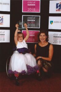 summer receiving her award