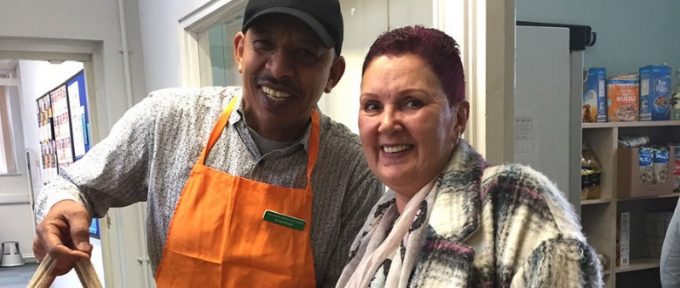 man and woman at community grocer