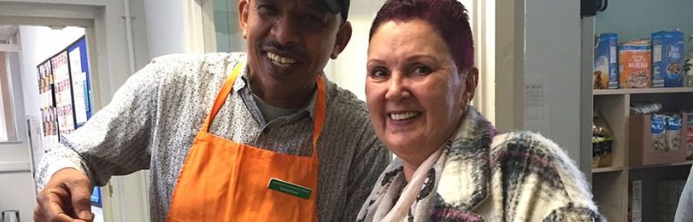 man and woman at community grocer