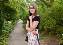 elin stood in front of trees and a path in the park