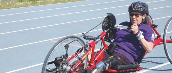 person with limb impairment taking part in sport