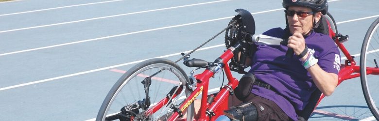 person with limb impairment taking part in sport