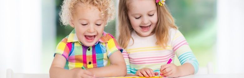 little boy and girl enjoying art at home