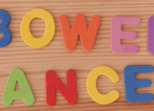 bowel cancer letters on wooden background