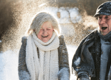 elderly couple in snow