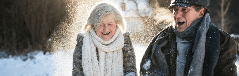 elderly couple in snow