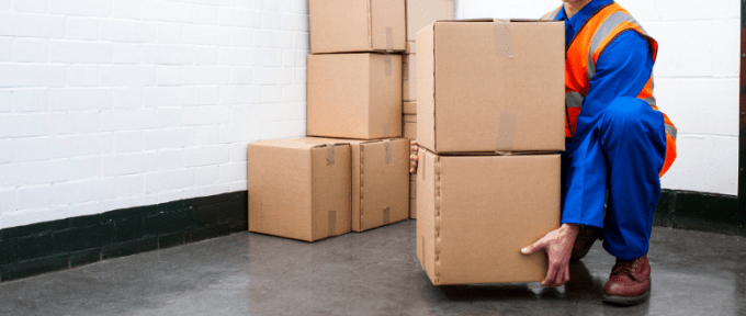 Moving and Handling Inanimate Objects - man lifting cardboard boxes